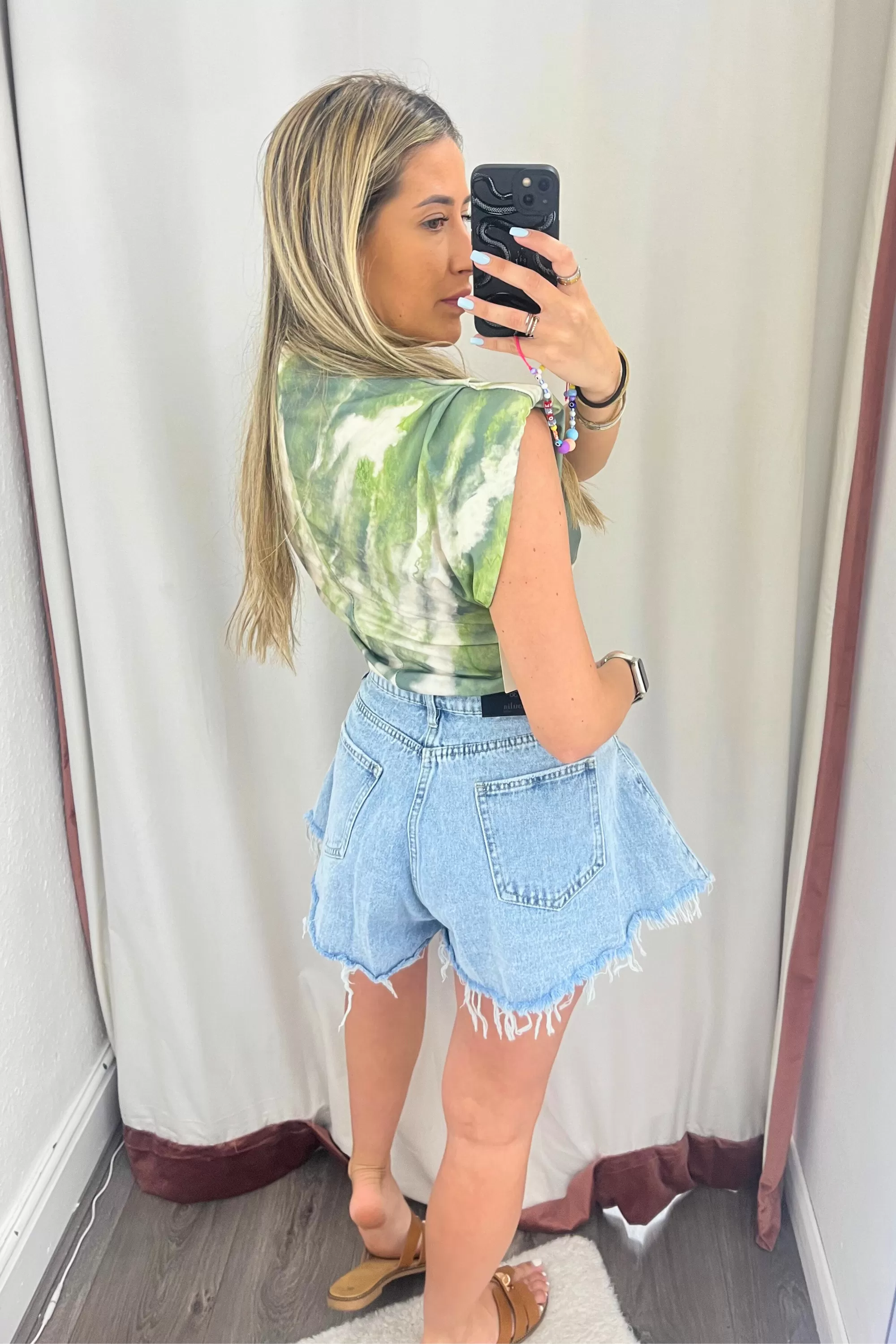 Green tie dye shoulder padded top