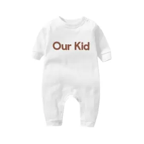 Our Kid Babygrow in White with Red Slogan