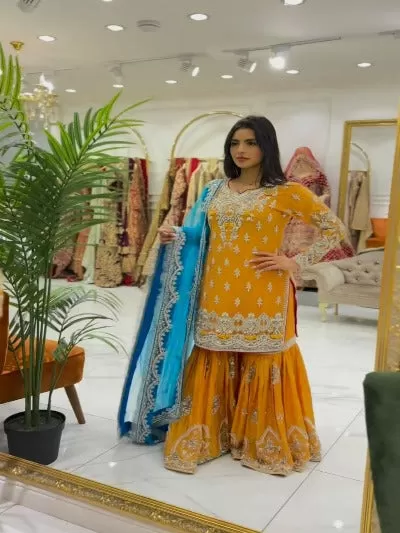 Yellow Georgette Embroidered Partywear Sharara Suit